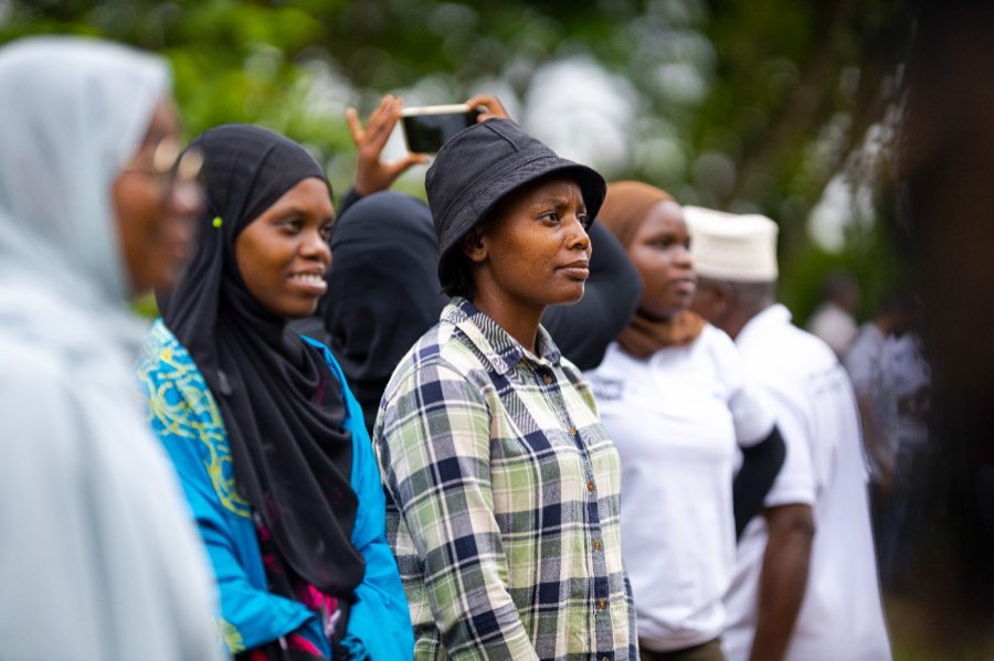 Youth gathered outdoors for community engagement